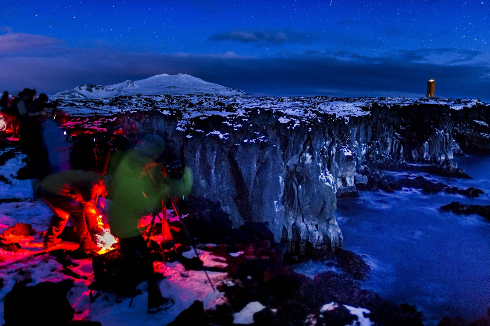 Photographers at twilight on the Snæfellsnes coast, Iceland