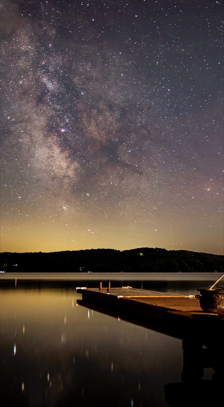 The Milky Way over a still lake